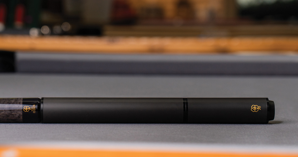 4-inch and 7-inch sections combined into an 11-inch extension on a McDermott cue